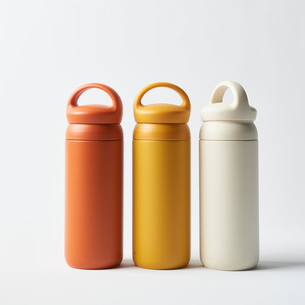orange, yellow and white water bottle
