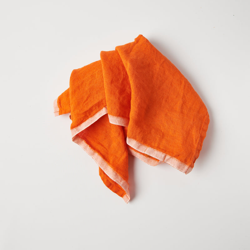 orange laundered linen towel