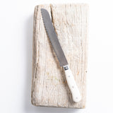 white handle French bread knife