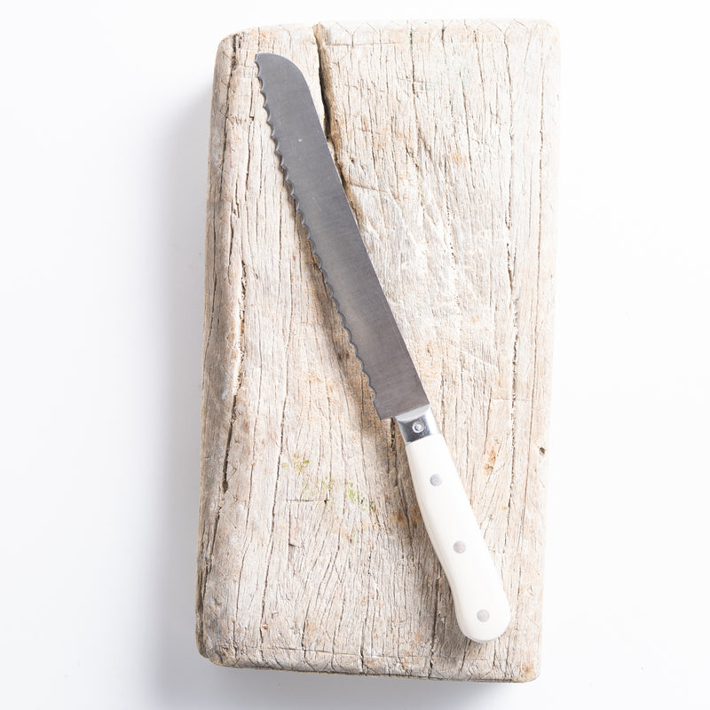 white handle French bread knife
